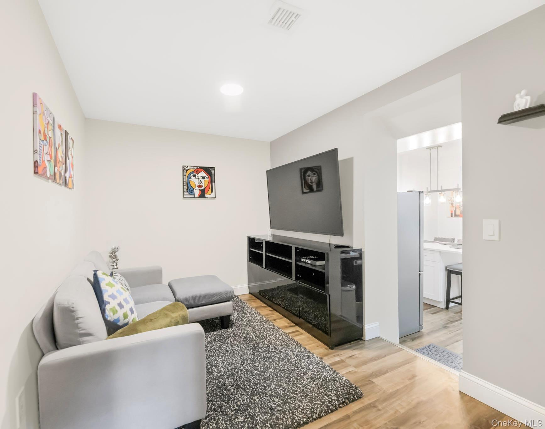 248 Rockne Road Yonkers, NY 10701 - Photo 8 of 40 Living room featuring light wood-style flooring and recessed lighting