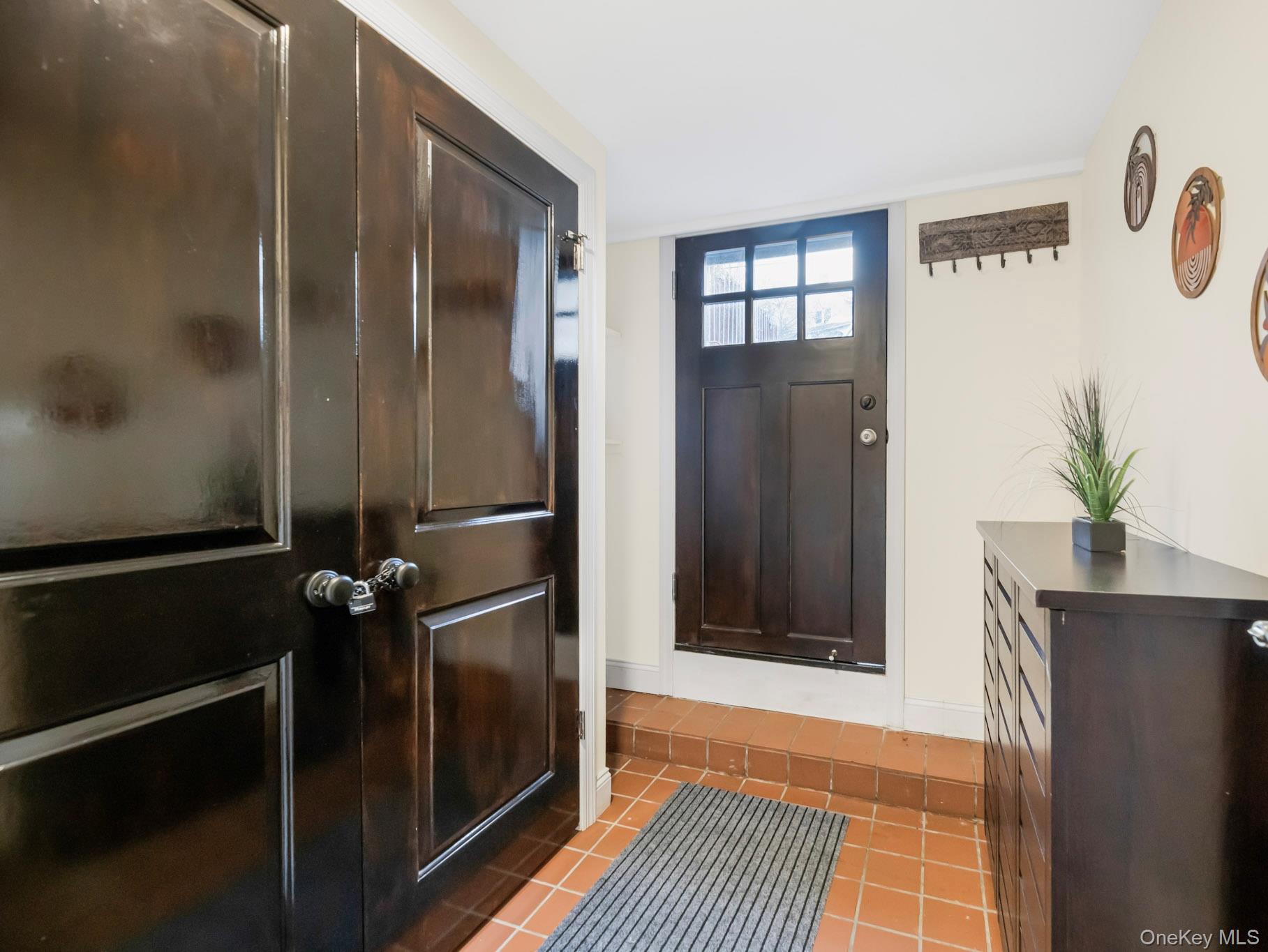 248 Rockne Road Yonkers, NY 10701 - Photo 9 of 40 Entrance foyer featuring light tile patterned floors and baseboards