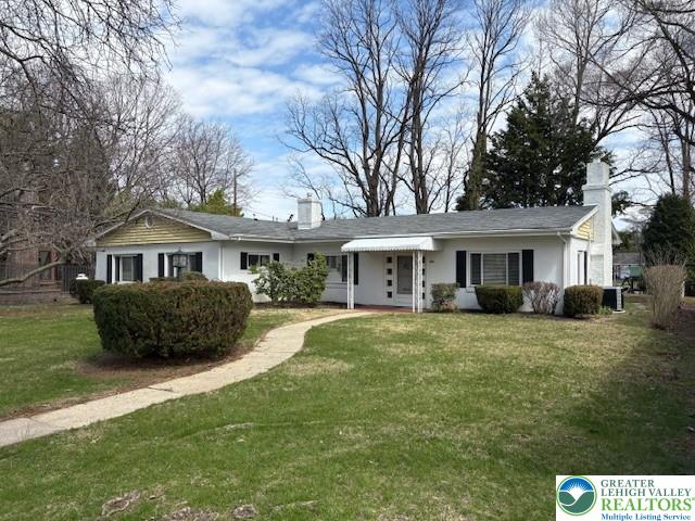 627 North Main Street Allentown, PA 18104 - Photo 1 of 24 a front view of a house with a garden