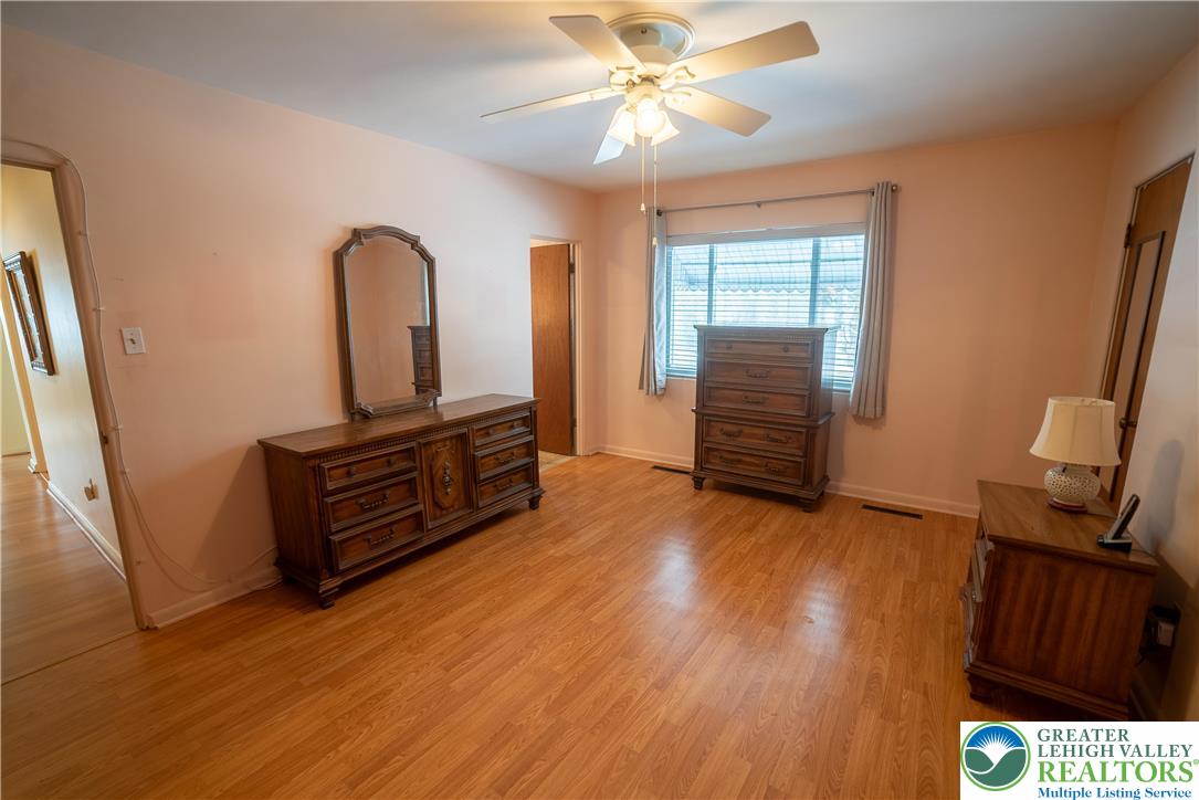 627 North Main Street Allentown, PA 18104 - Photo 18 of 24 a living room with furniture and a flat screen tv