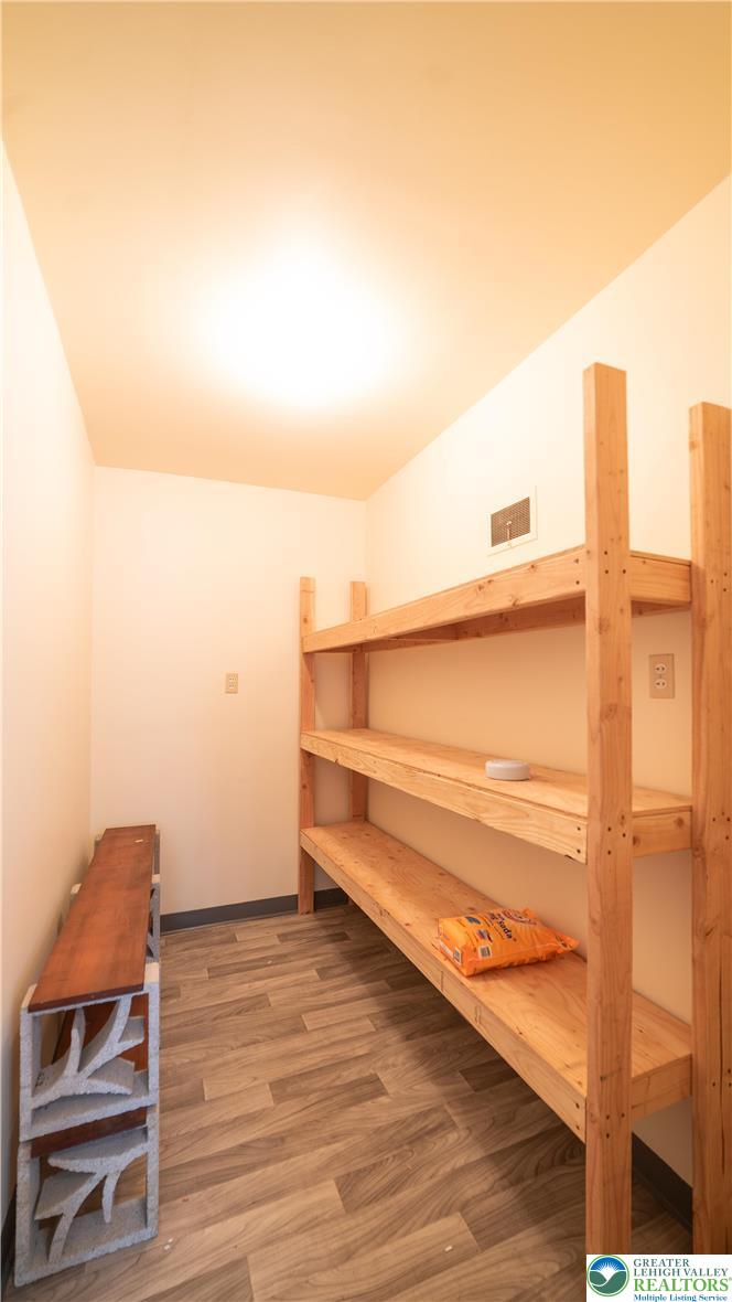 627 North Main Street Allentown, PA 18104 - Photo 22 of 24 a view of a room with wooden floor and bench