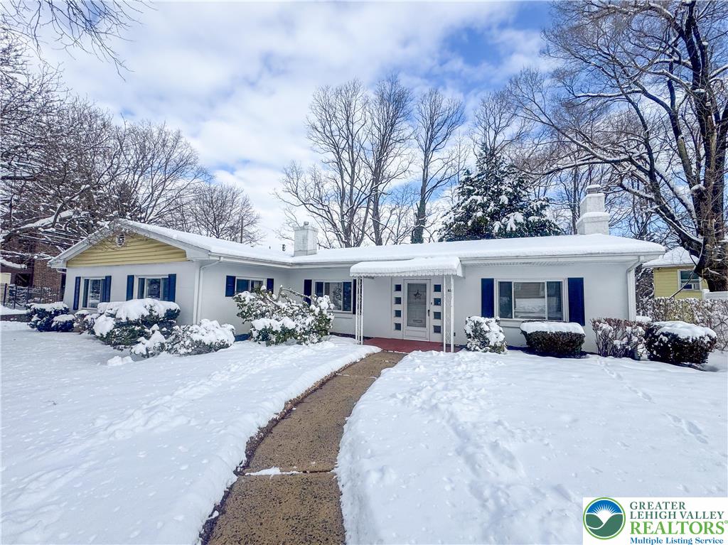 627 North Main Street Allentown, PA 18104 - Photo 3 of 24 a front view of a house with yard patio and fire pit