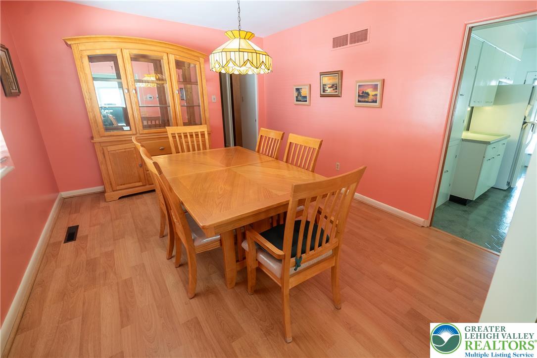 627 North Main Street Allentown, PA 18104 - Photo 7 of 24 a view of a dining room with furniture and wooden floor