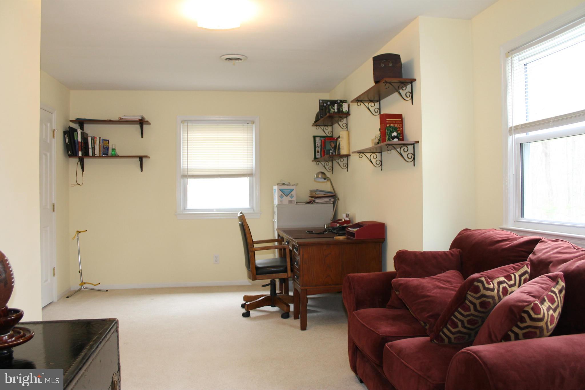 9592 Jamesons Mill Road Culpeper, VA 22701 - Photo 22 of 30 a livingroom with workspace and a window