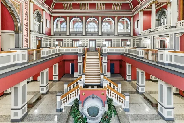 a kitchen with stove and cabinets