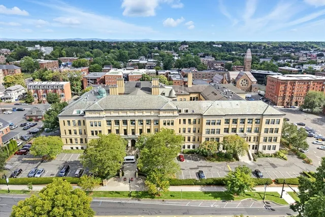 an aerial view of a city with lots of residential buildings