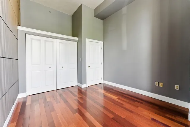 a view of wooden floor with entryway