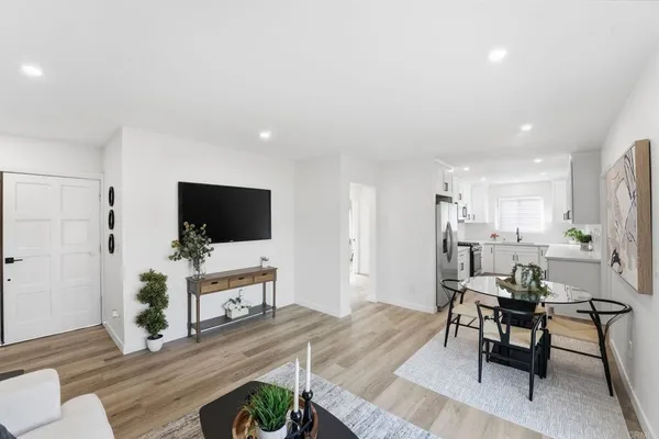 a kitchen with a sink cabinets and window