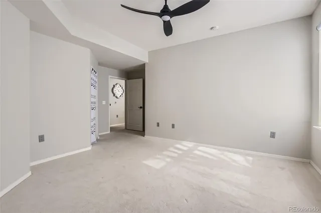 a bathroom with a double vanity sink toilet mirror and shower