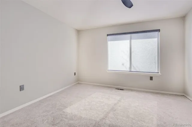 a bathroom with a sink a toilet and a shower