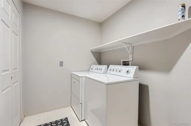 an aerial view of multiple houses with yard