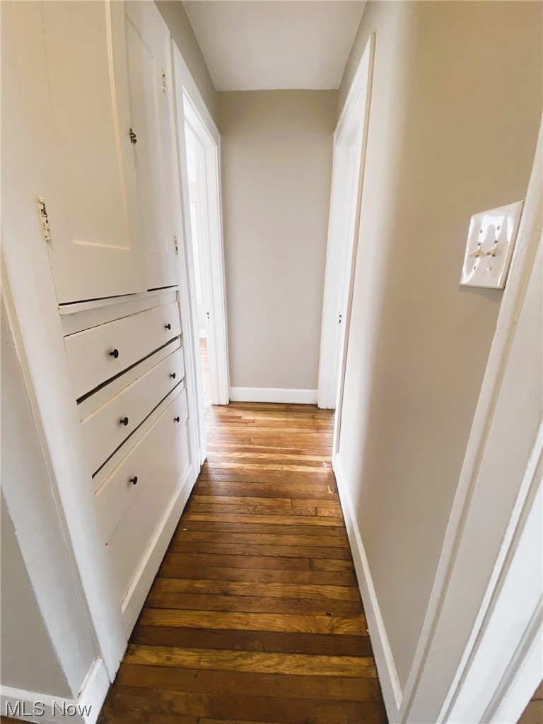 3586 Cedarbrook Road Cleveland, OH 44118 - Photo 20 of 30 Hallway featuring dark hardwood / wood-style floors