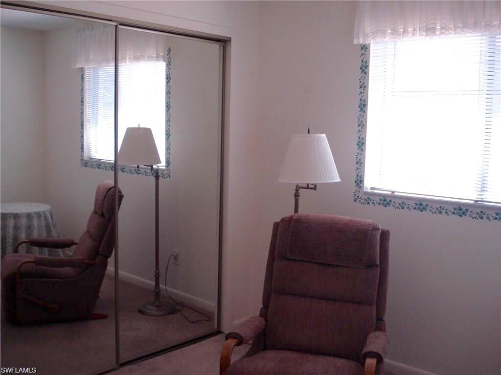 18057 Laurel Valley Road Fort Myers, FL 33967 - Photo 20 of 25 a living room with furniture and a window