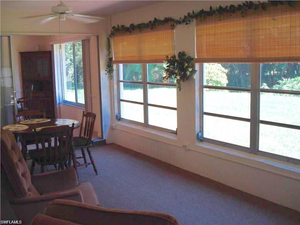 18057 Laurel Valley Road Fort Myers, FL 33967 - Photo 23 of 25 a dining room with furniture and window
