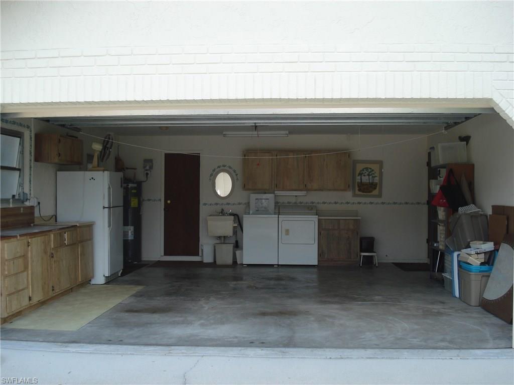 18057 Laurel Valley Road Fort Myers, FL 33967 - Photo 25 of 25 a bathroom with a sink and a mirror
