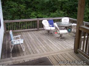 467 Curry Road Mount Solon, VA 22843 - Photo 8 of 12 a view of deck with two chairs and wooden floor