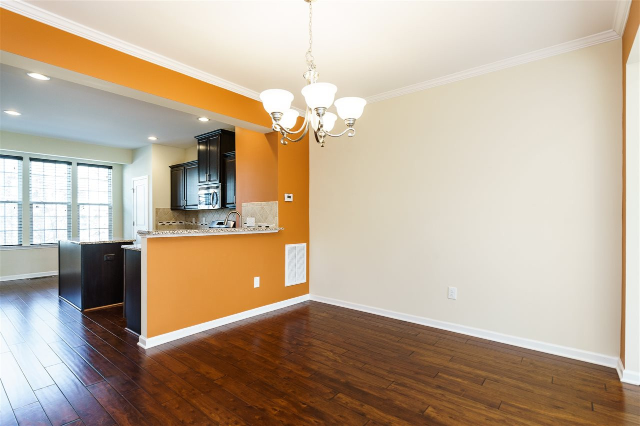 5635 Wade Park Boulevard Raleigh, NC 27607 - Photo 8 of 25 Enjoy this beautiful dining room with hardwoods. Option to add bar stools to this room as well. Dining Room