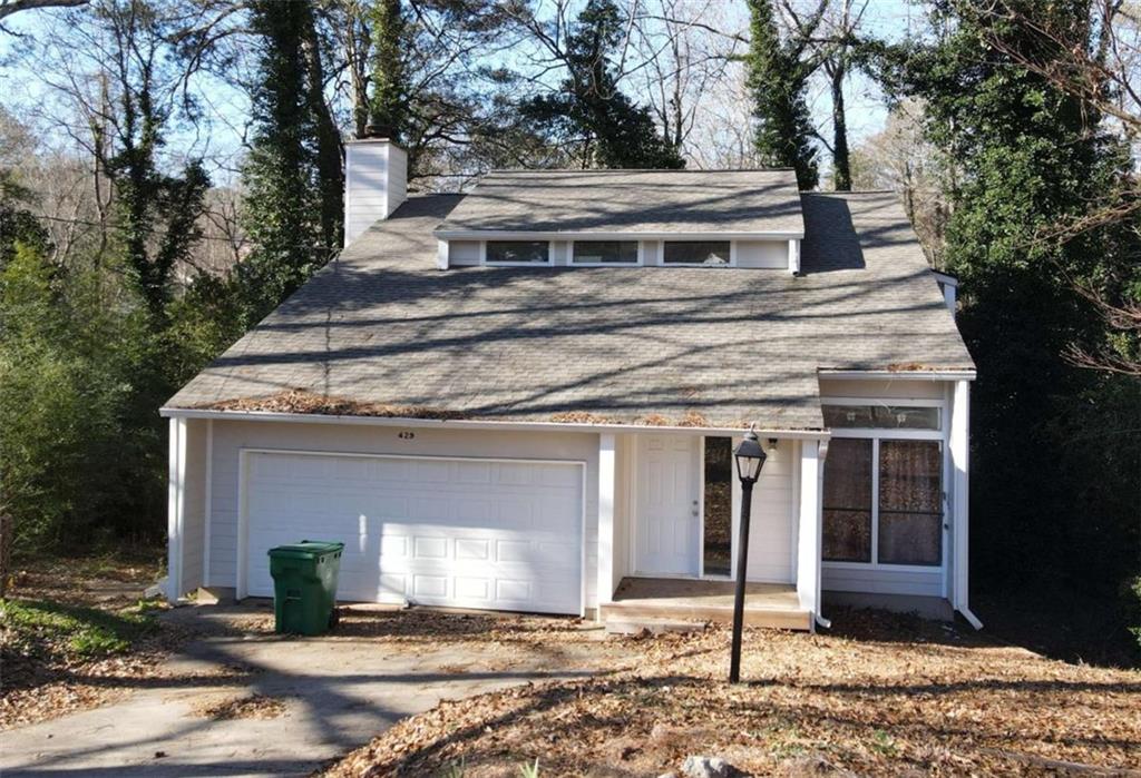 429 Rue De Chateau Stone Mountain, GA 30083 - Photo 2 of 3 a front view of a house