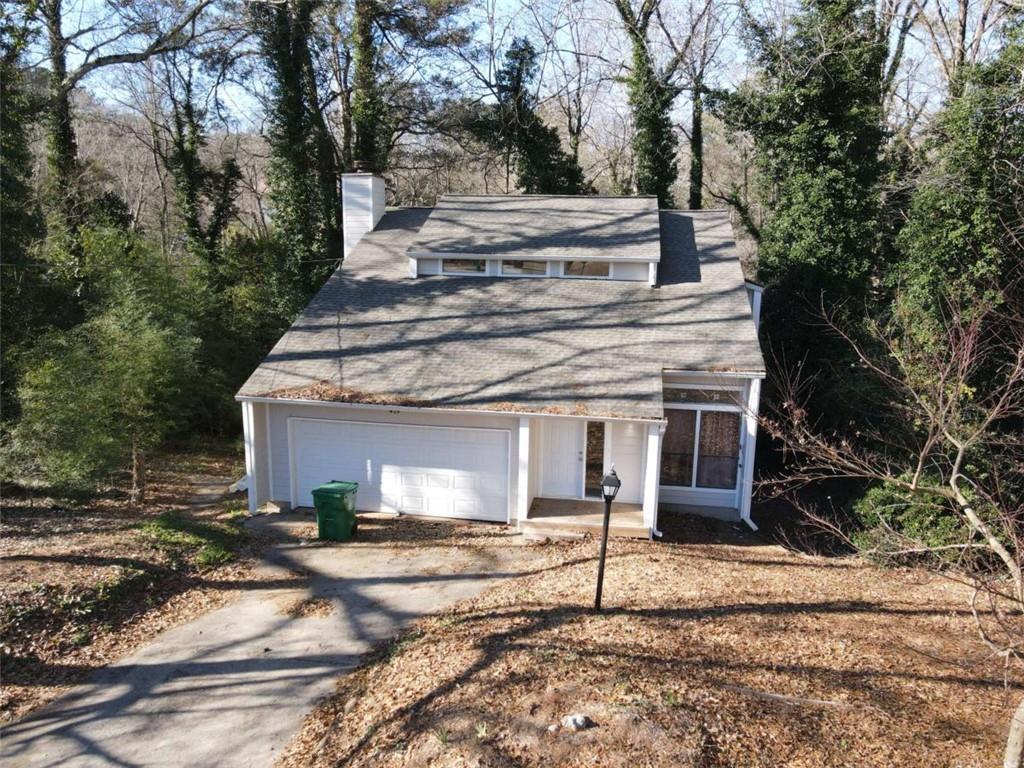 429 Rue De Chateau Stone Mountain, GA 30083 - Photo 3 of 3 a view of a house with a yard