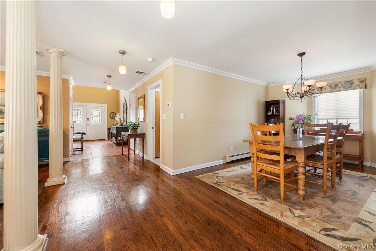 40 East Penn Street Long Beach, NY 11561 - Photo 13 of 41 a view of a dining room with furniture window and wooden floor