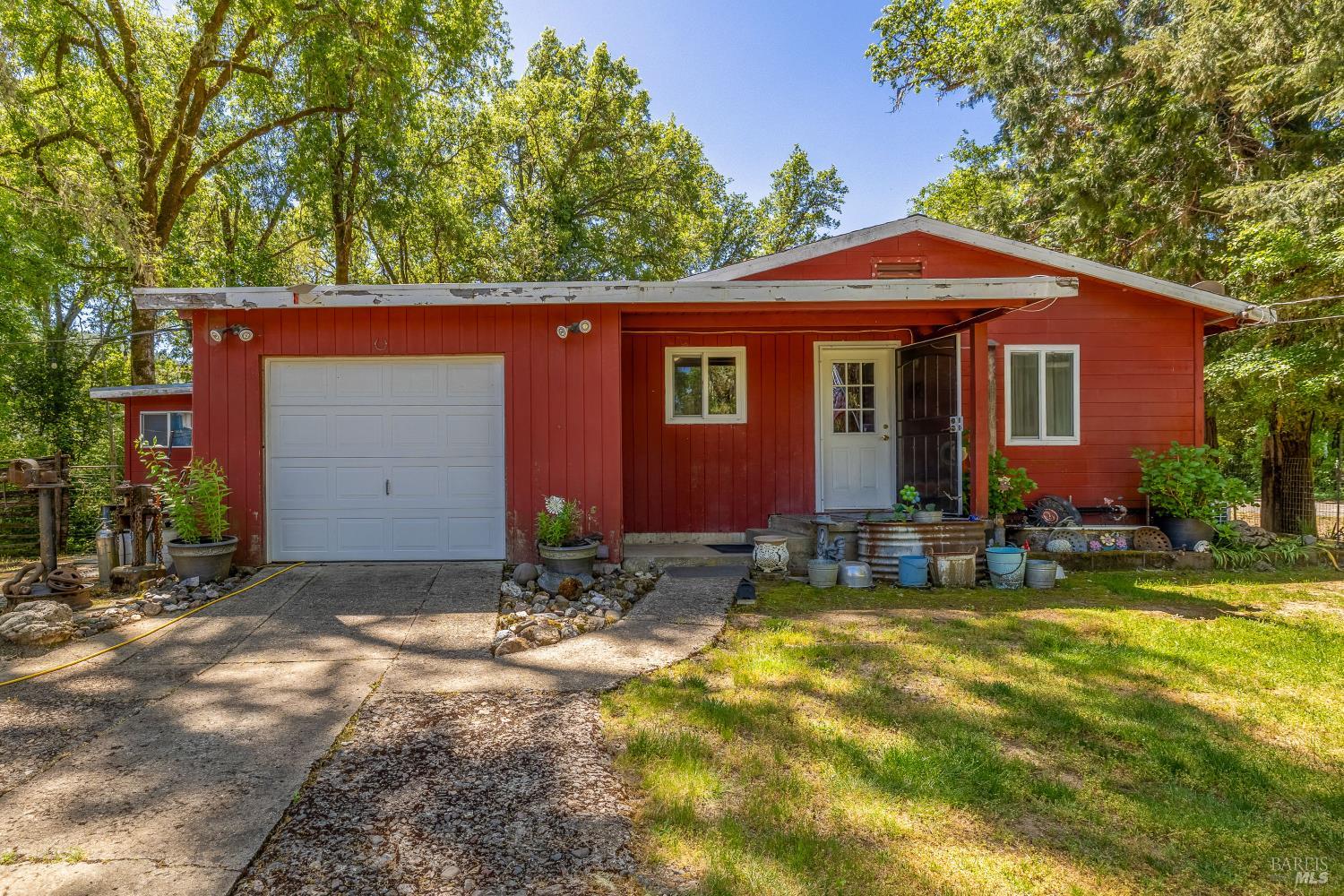 a view of house with yard