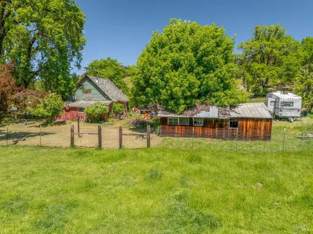 a house with swimming pool in front of it
