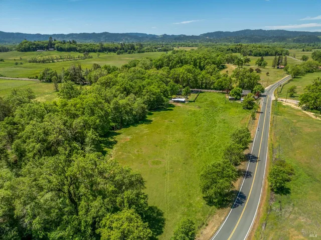 a view of a city with a lake