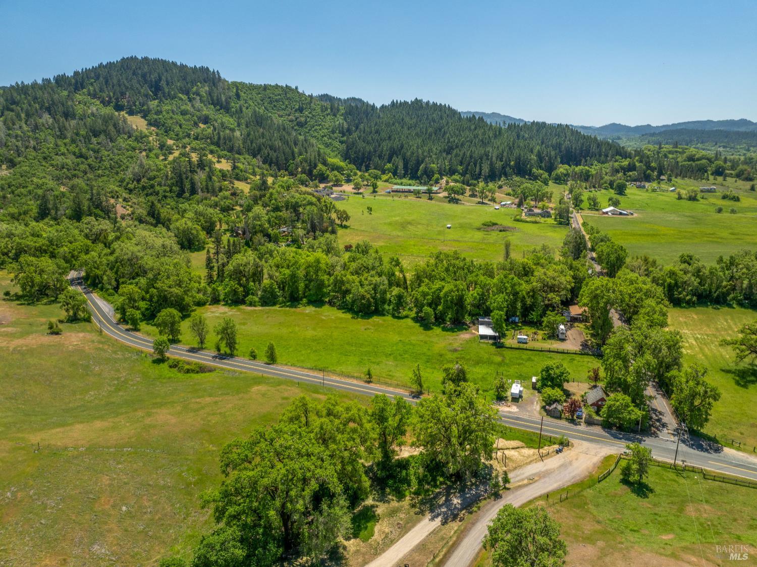 3901 Canyon Road Willits, CA 95490 - Photo 30 of 35 a view of a city with lush green forest