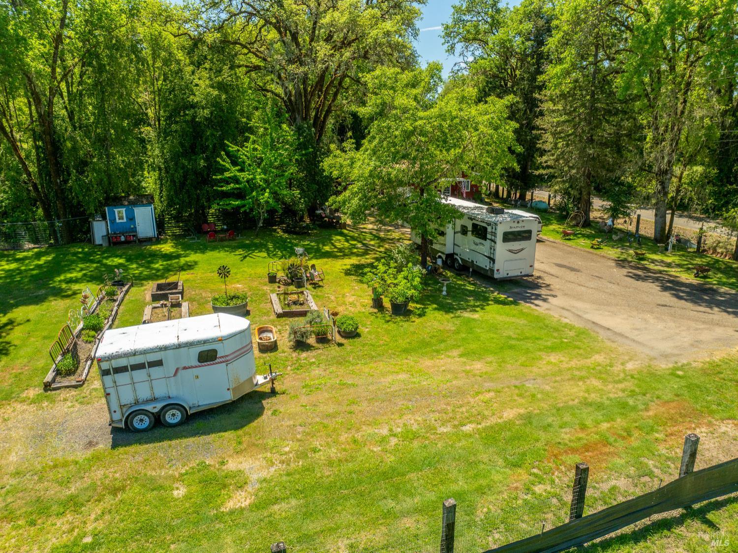 3901 Canyon Road Willits, CA 95490 - Photo 32 of 35 a backyard of a house with yard and outdoor seating
