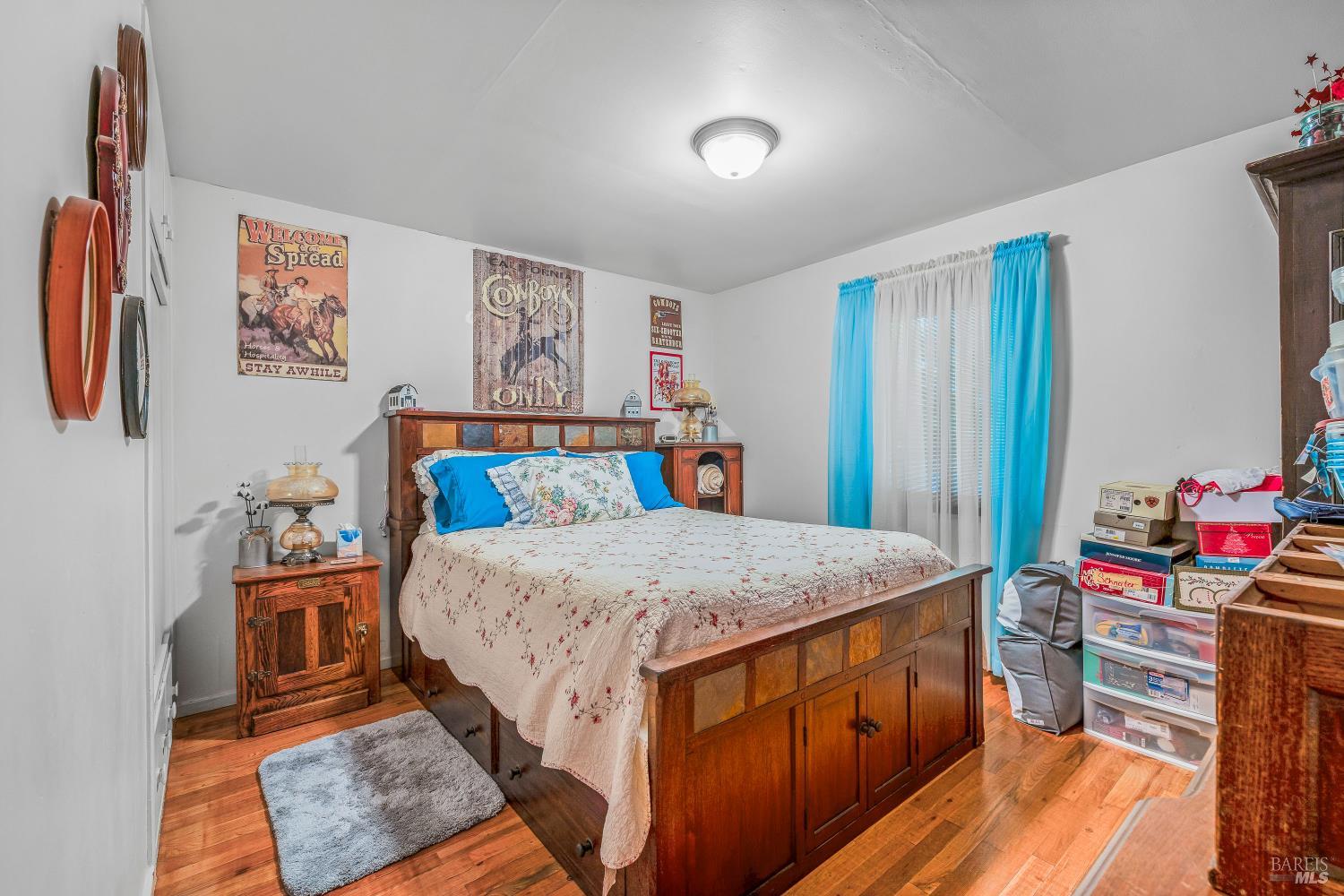3901 Canyon Road Willits, CA 95490 - Photo 8 of 35 a bedroom with a bed and a dresser in it