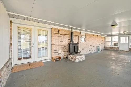 a view of walk in closet with wooden floor