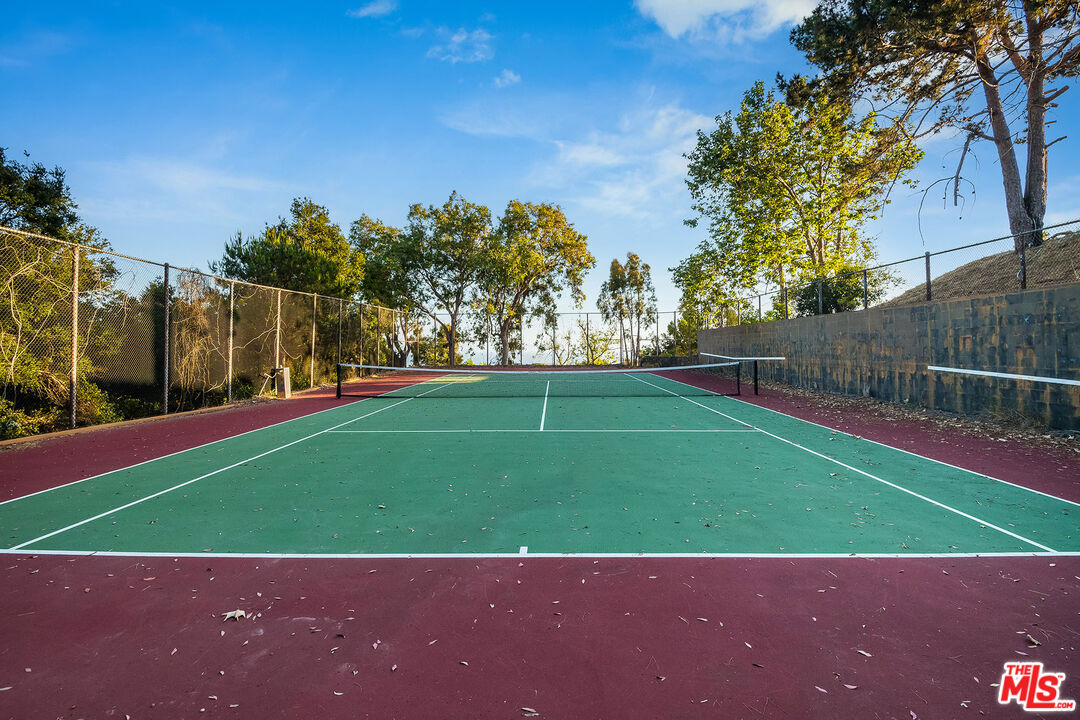 29829 Harvester Road Malibu, CA 90265 - Photo 22 of 44 a view of a field with a small yard
