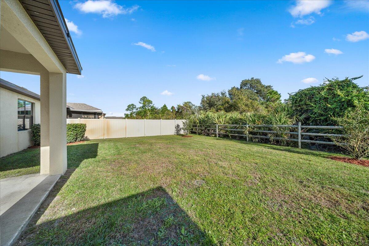 710 Old Country Rd S East Palm Bay, FL 32909 - Photo 21 of 27 a view of a backyard