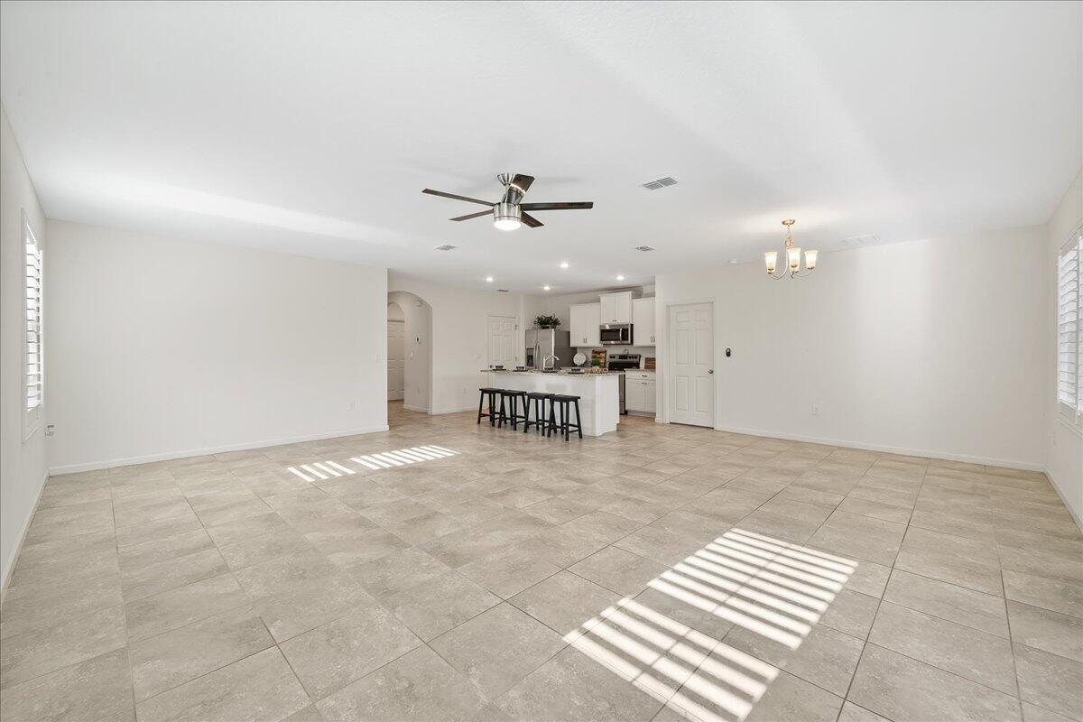 710 Old Country Rd S East Palm Bay, FL 32909 - Photo 10 of 27 a view of a livingroom with a kitchen