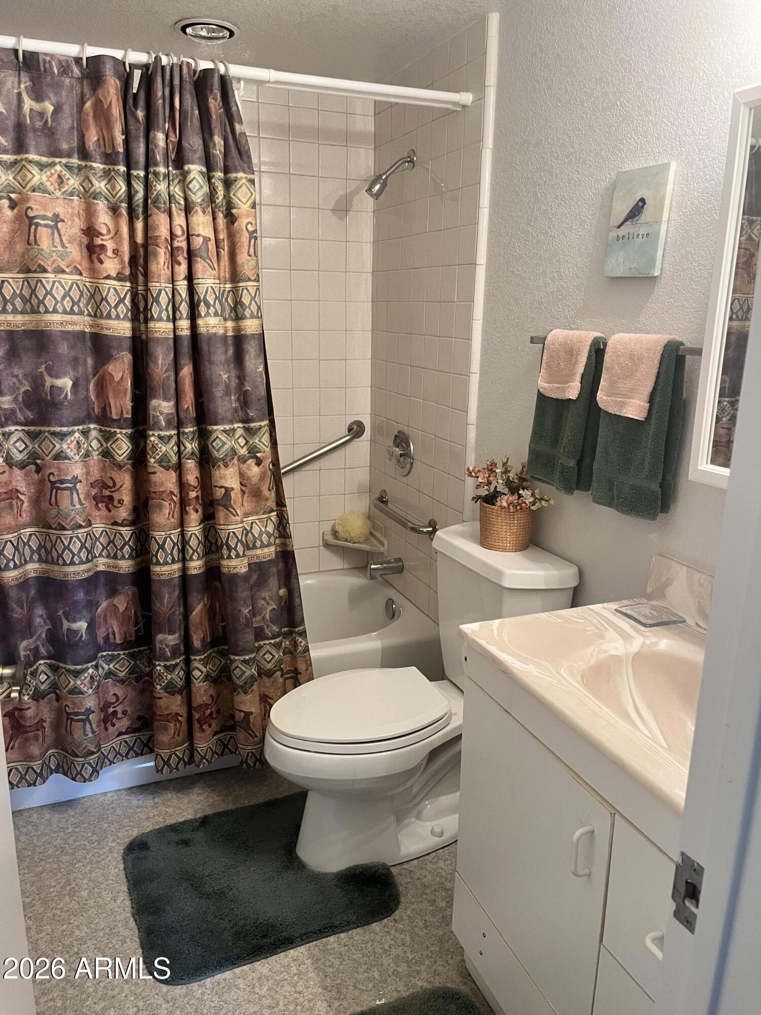 1006 North Matterhorn Road Payson, AZ 85541 - Photo 22 of 37 a bathroom with a sink toilet and shower