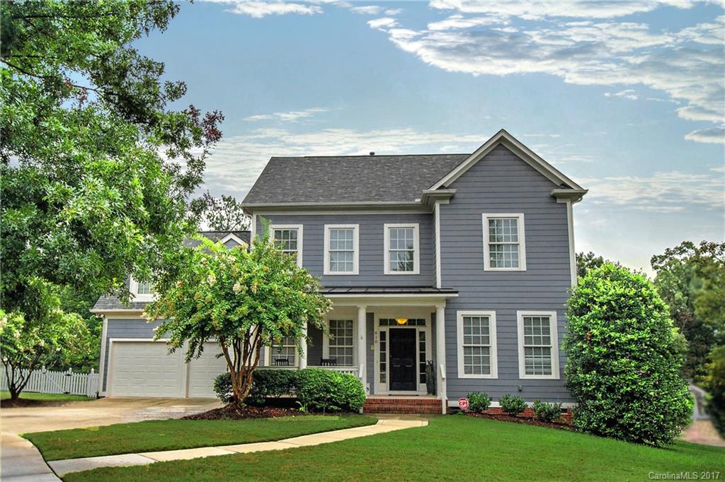 618 Lena Way Fort Mill, SC 29708 - Photo 1 of 24 a front view of a house with a yard and trees