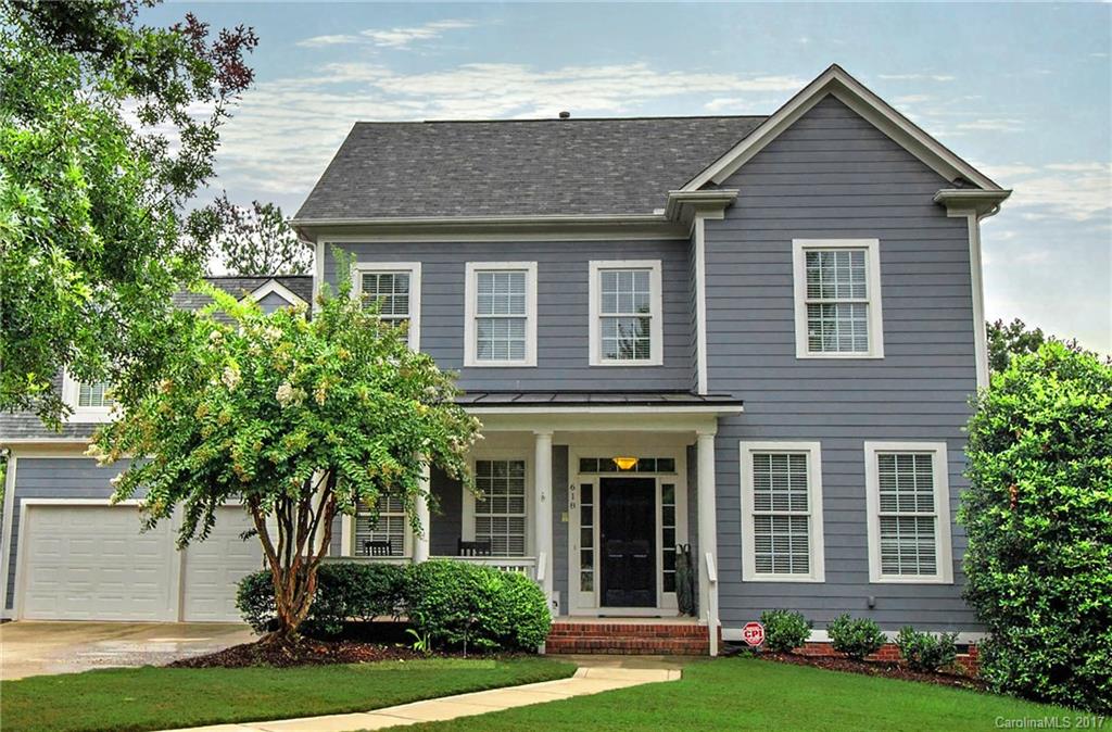 618 Lena Way Fort Mill, SC 29708 - Photo 2 of 24 a front view of a house with garden