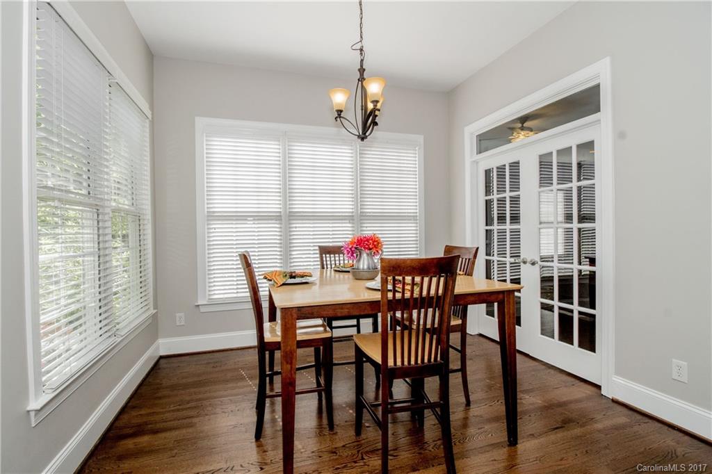 618 Lena Way Fort Mill, SC 29708 - Photo 13 of 24 a view of a dining room with furniture window and wooden floor