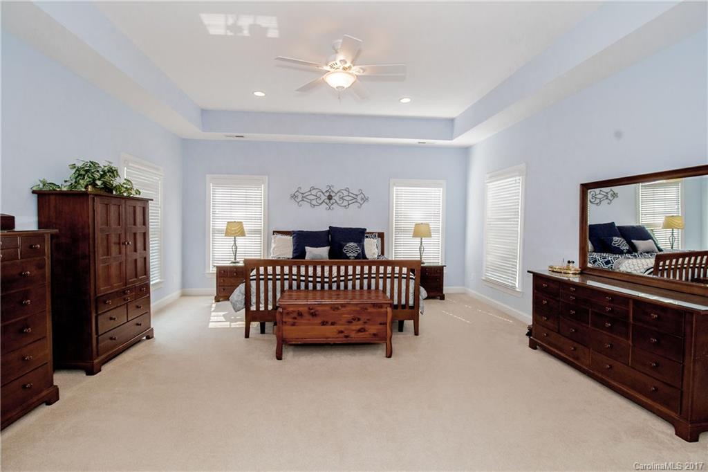 618 Lena Way Fort Mill, SC 29708 - Photo 16 of 24 a living room with furniture and a flat screen tv