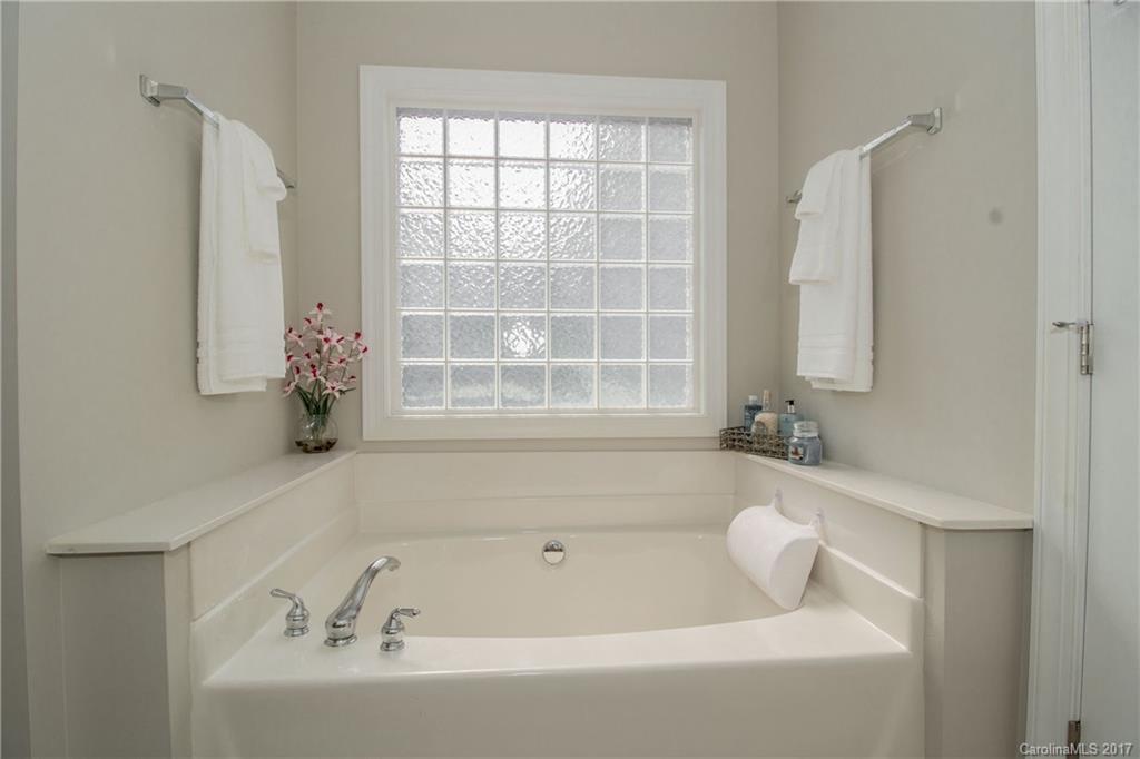 618 Lena Way Fort Mill, SC 29708 - Photo 18 of 24 a bath tub sitting next to a window