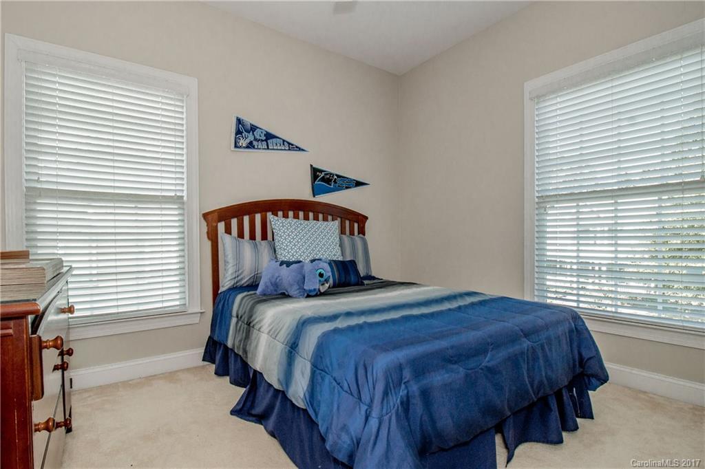 618 Lena Way Fort Mill, SC 29708 - Photo 19 of 24 a bedroom with a bed and window