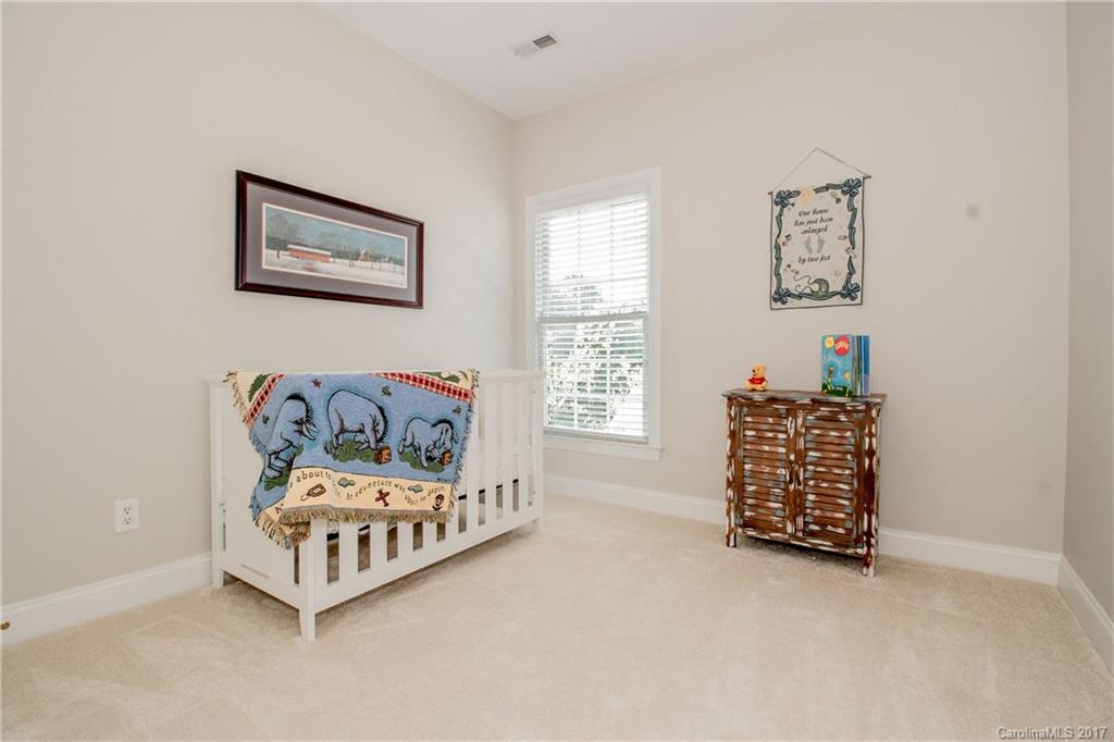 618 Lena Way Fort Mill, SC 29708 - Photo 20 of 24 a bedroom with furniture and a window