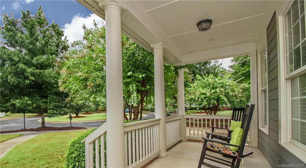 618 Lena Way Fort Mill, SC 29708 - Photo 3 of 24 a view of a porch with furniture and garden