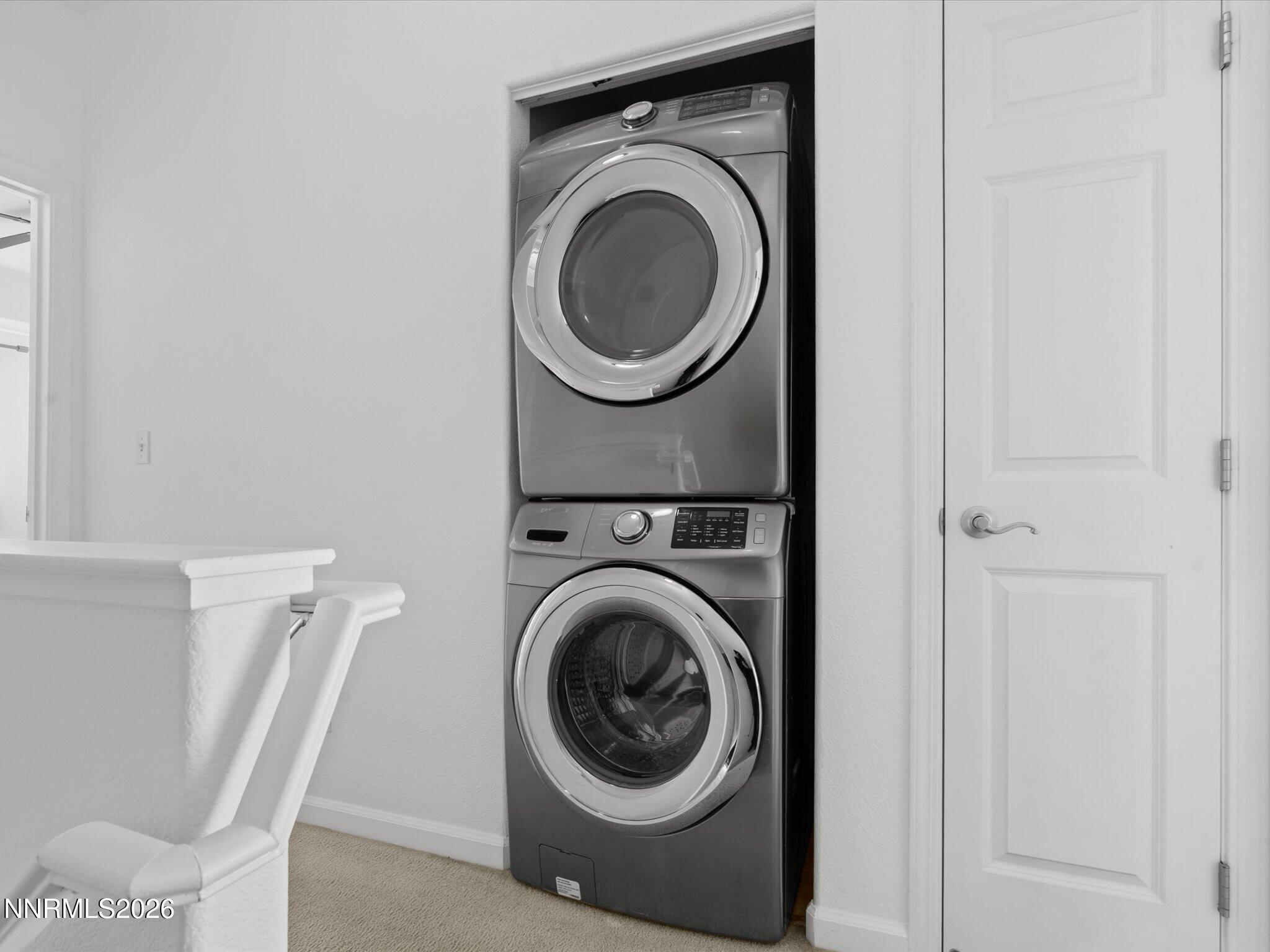 4795 Ciarra Kennedy Lane Reno, NV 89503 - Photo 27 of 37 a utility room with sink dryer and washer