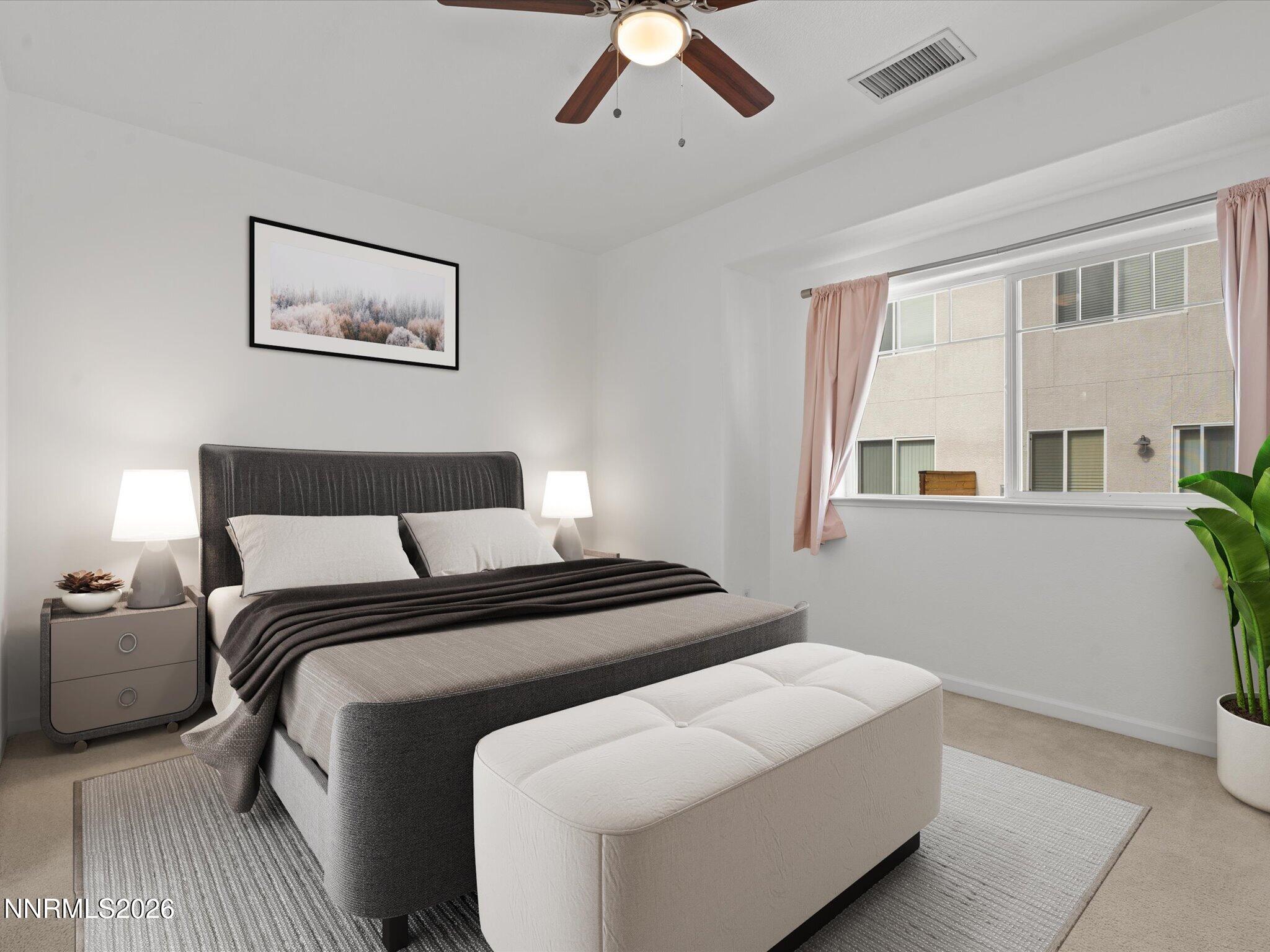 4795 Ciarra Kennedy Lane Reno, NV 89503 - Photo 8 of 37 a bedroom with bed and window