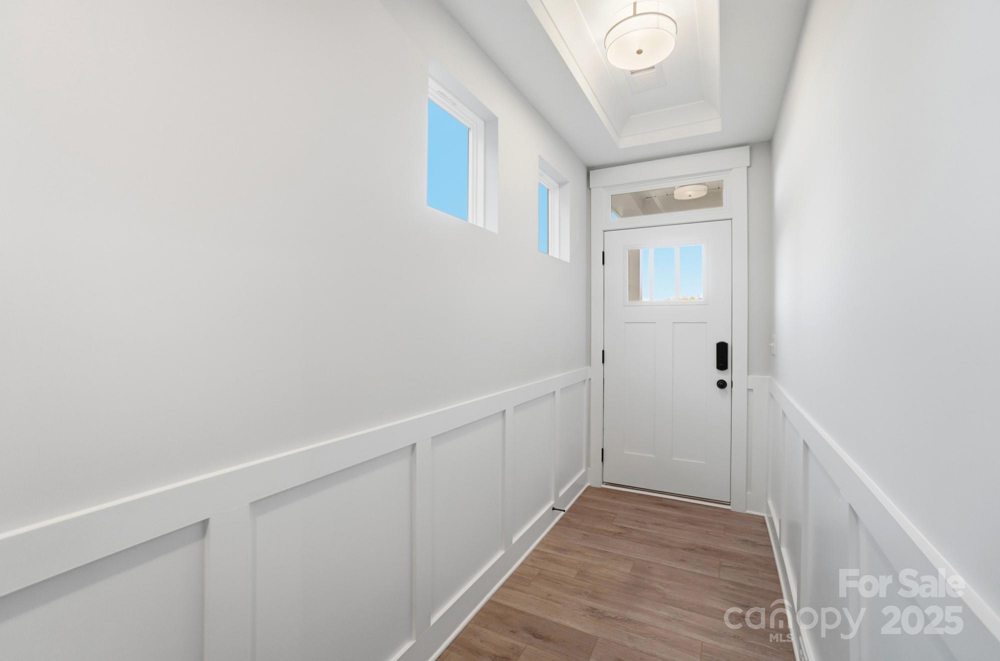 123 Viburnum Road Waxhaw, NC 28173 - Photo 3 of 28 a view of hallway with window