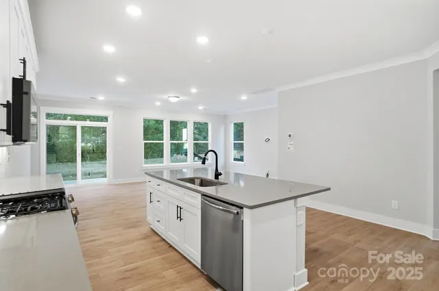 a very nice looking living room with a large window