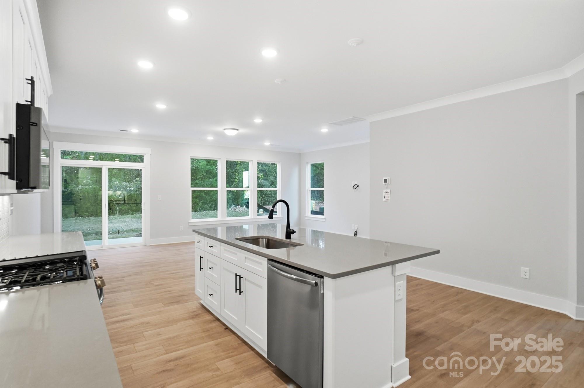 123 Viburnum Road Waxhaw, NC 28173 - Photo 6 of 28 a very nice looking living room with a large window