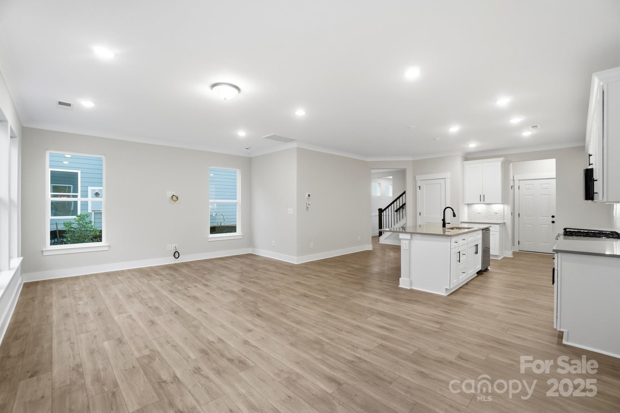 123 Viburnum Road Waxhaw, NC 28173 - Photo 9 of 28 a view of kitchen with sink and refrigerator