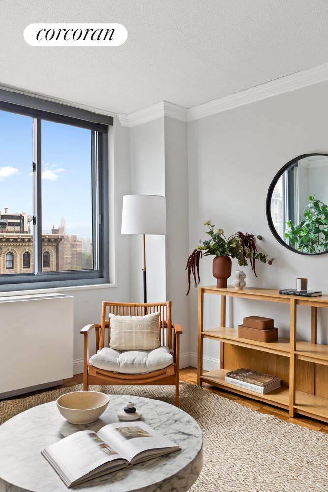 2025 Broadway, Unit 17F Manhattan, NY 10023 - Photo 3 of 15 a living room with furniture